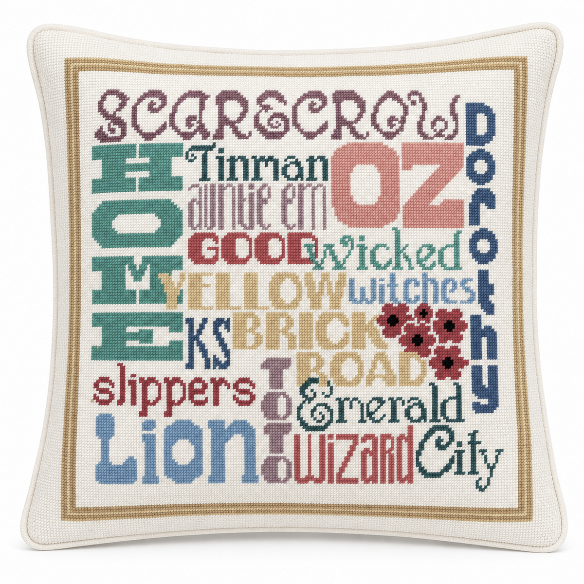 Wizard of Oz needlepoint pillow on a white background, showing the Oz-themed word-art design