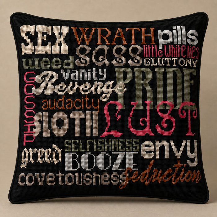 Sins black and white cross-stitch pillow kit on black canvas, studio lifestyle photo