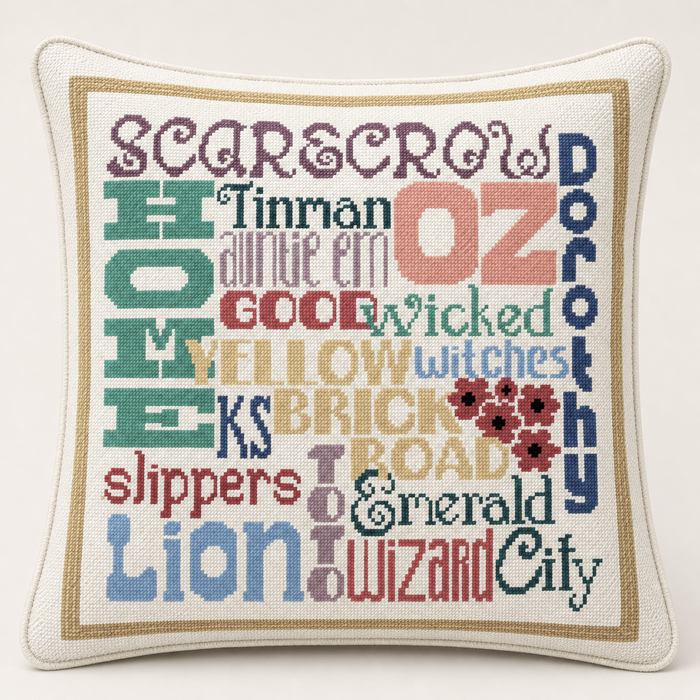 Wizard of Oz needlepoint pillow kit featuring colorful Oz-themed word art, studio lifestyle photo